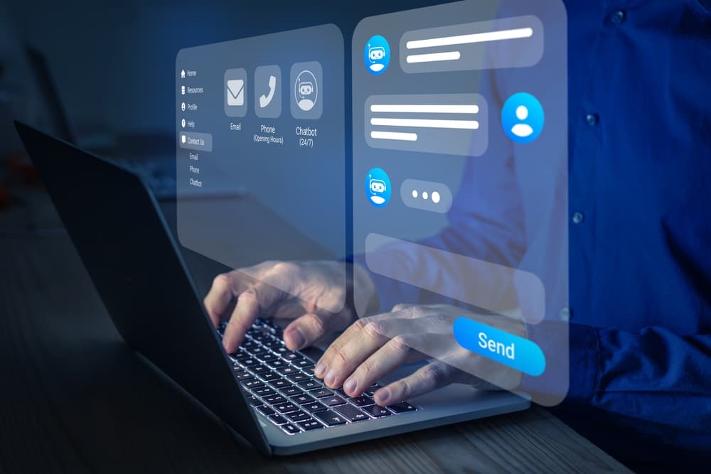 Contact Us - Person typing on laptop