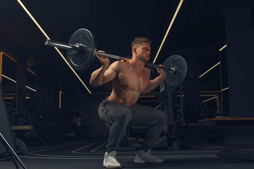 Man lifting weights at  Pani Da Bulbulla Studio